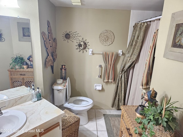 997 Sonesta Ave NE Unit 202, Palm Bay, FL 32905 - bathroom featuring tile patterned flooring, vanity, and a shower with curtain