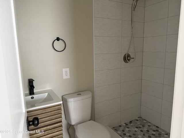 4111 Edward St, Melbourne, FL 32901 - bathroom featuring a tile shower and toilet
