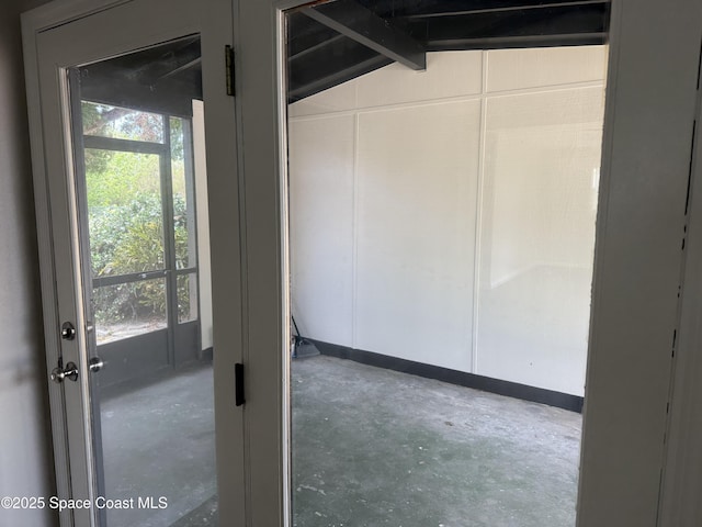 4111 Edward St, Melbourne, FL 32901 - interior space with healthy amount of natural light, unfinished concrete floors, and lofted ceiling