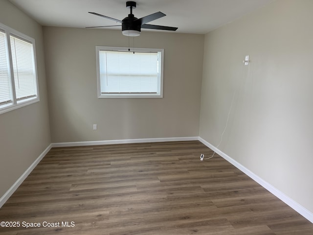 4111 Edward St, Melbourne, FL 32901 - spare room with a ceiling fan, healthy amount of natural light, and wood finished floors