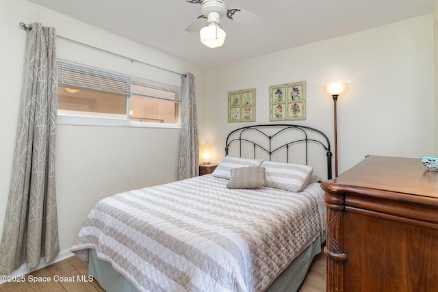 3150 N Atlantic Ave Unit 7-440, Cocoa Beach, FL 32931 - bedroom featuring light wood-type flooring and ceiling fan