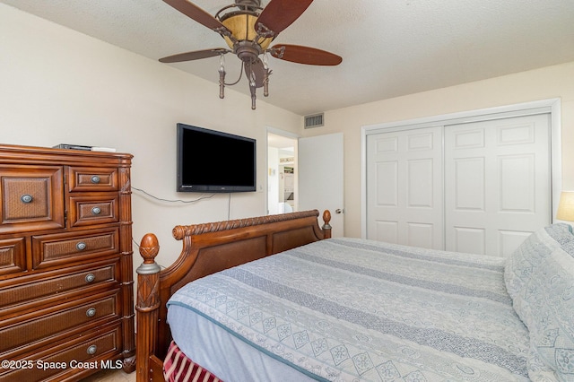 3150 N Atlantic Ave Unit 7-440, Cocoa Beach, FL 32931 - bedroom with a closet and a ceiling fan