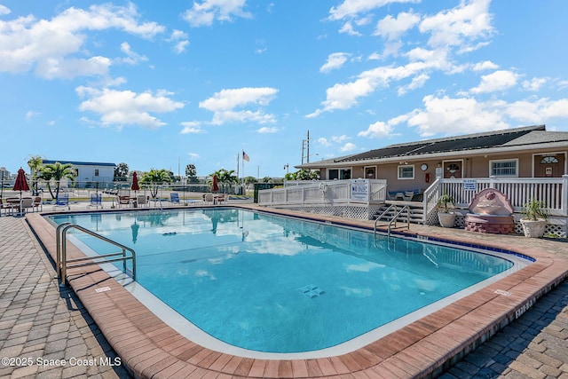 3150 N Atlantic Ave Unit 7-440, Cocoa Beach, FL 32931 - community pool with a deck