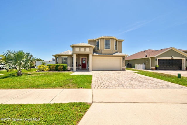 4082 Brantley Cir, Rockledge, FL 32955 - view of front of property with driveway, stucco siding, a front yard, and a garage