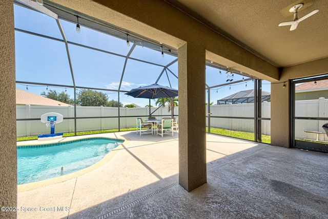 4082 Brantley Cir, Rockledge, FL 32955 - view of swimming pool with a patio area, glass enclosure, and a fenced backyard