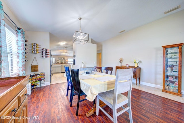 4082 Brantley Cir, Rockledge, FL 32955 - dining room with a chandelier and wood finished floors
