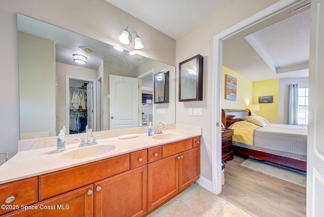 4082 Brantley Cir, Rockledge, FL 32955 - full bath with ensuite bath, double vanity, and a spacious closet