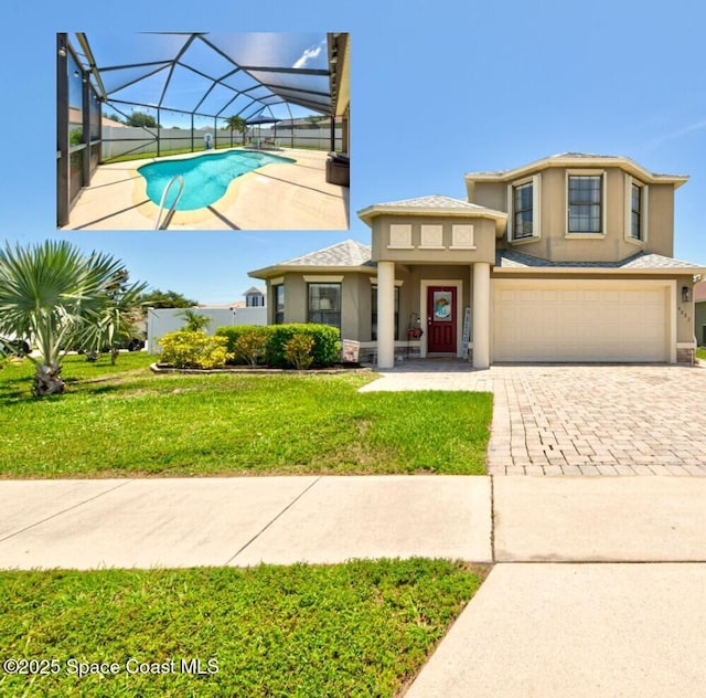 4082 Brantley Cir, Rockledge, FL 32955 - view of front of home with decorative driveway, stucco siding, a front lawn, and a garage