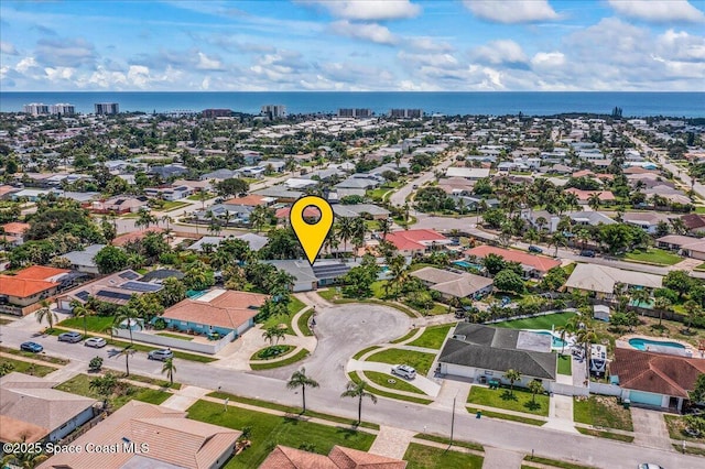 380 Cherry Ct, Satellite Beach, FL 32937 - aerial perspective of suburban area with a nearby body of water