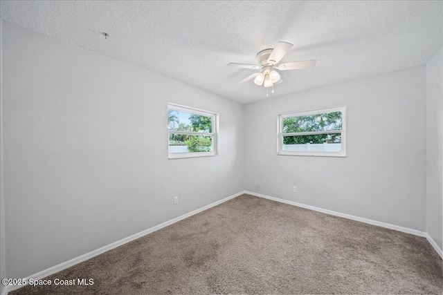 380 Cherry Ct, Satellite Beach, FL 32937 - carpeted empty room with a ceiling fan and a textured ceiling