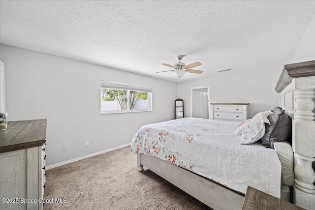 380 Cherry Ct, Satellite Beach, FL 32937 - bedroom featuring carpet, a ceiling fan, and a textured ceiling