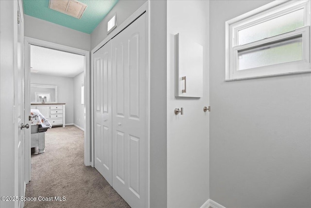 380 Cherry Ct, Satellite Beach, FL 32937 - hall featuring carpet floors and plenty of natural light