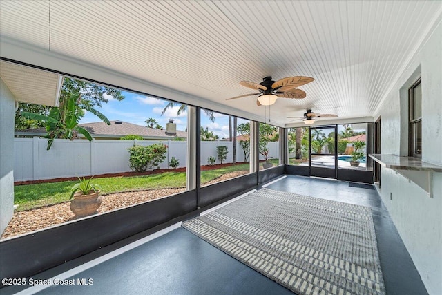 380 Cherry Ct, Satellite Beach, FL 32937 - unfurnished sunroom featuring a ceiling fan