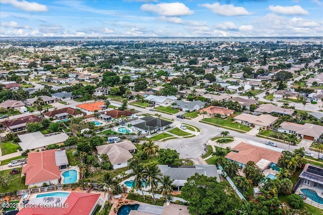 380 Cherry Ct, Satellite Beach, FL 32937 - aerial perspective of suburban area featuring a pool area