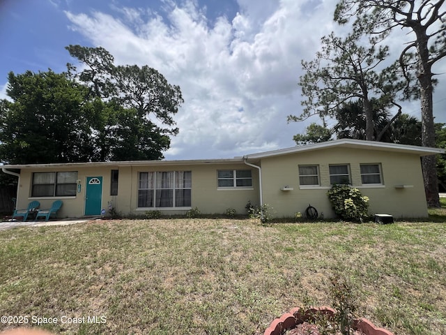 1109 Alamanda Ln, Cocoa, FL 32922 - single story home with concrete block siding and a front yard