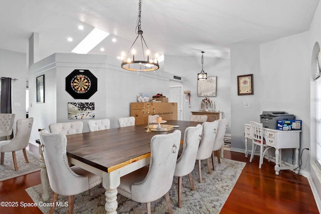 1276 Cypress Trace Dr, Melbourne, FL 32940 - dining room with a chandelier, wood finished floors, vaulted ceiling, and recessed lighting
