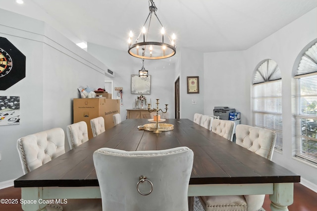 1276 Cypress Trace Dr, Melbourne, FL 32940 - dining space featuring a chandelier and baseboards