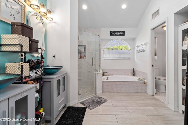 1276 Cypress Trace Dr, Melbourne, FL 32940 - full bath with vanity, a bath, a stall shower, and recessed lighting