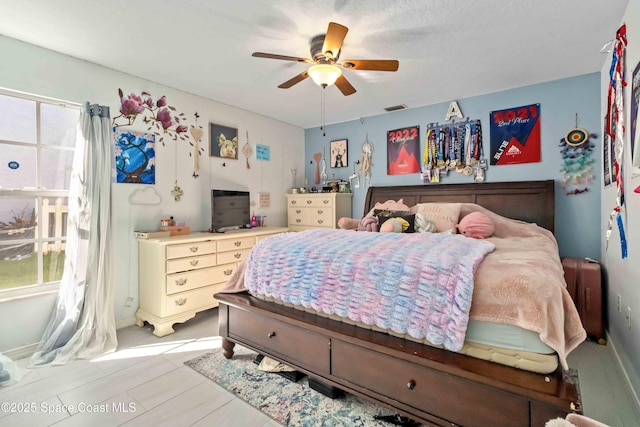 1276 Cypress Trace Dr, Melbourne, FL 32940 - bedroom featuring a ceiling fan