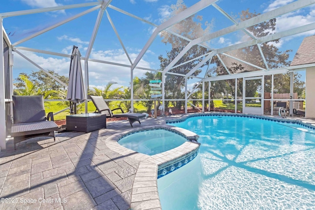 1276 Cypress Trace Dr, Melbourne, FL 32940 - view of pool featuring a patio, a pool with connected hot tub, and a lanai