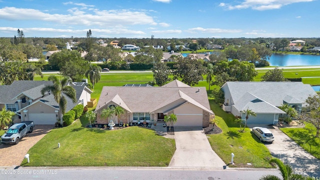 1276 Cypress Trace Dr, Melbourne, FL 32940 - aerial view of residential area with a nearby body of water