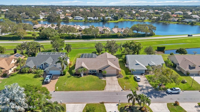 1276 Cypress Trace Dr, Melbourne, FL 32940 - aerial view of residential area featuring a large body of water