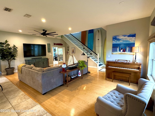 52 Riverview Ln, Cocoa Beach, FL 32931 - living room with wood finished floors, a ceiling fan, recessed lighting, and stairs
