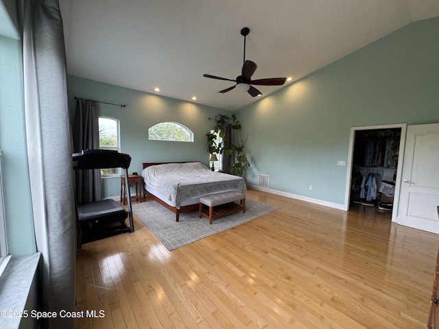 52 Riverview Ln, Cocoa Beach, FL 32931 - bedroom featuring hardwood / wood-style floors, recessed lighting, vaulted ceiling, and a ceiling fan