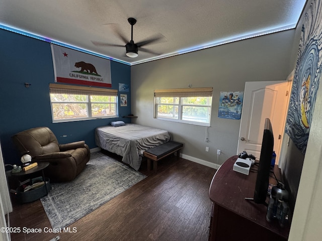 52 Riverview Ln, Cocoa Beach, FL 32931 - bedroom featuring wood finished floors and ceiling fan