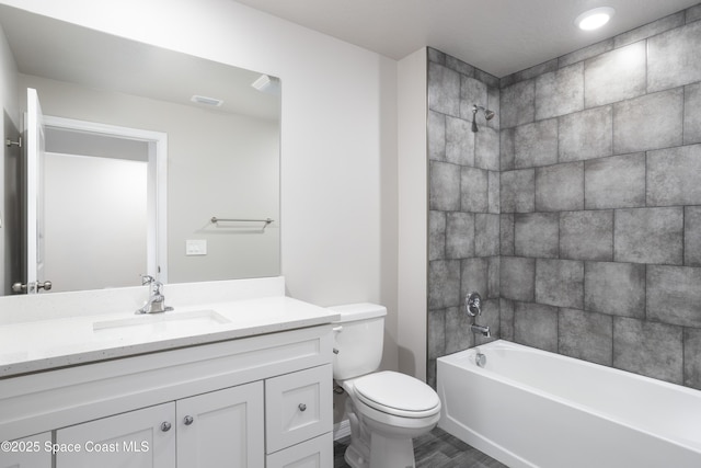 899 Brickell St SE, Palm Bay, FL 32909 - full bath featuring vanity, shower / bathtub combination, and wood finished floors