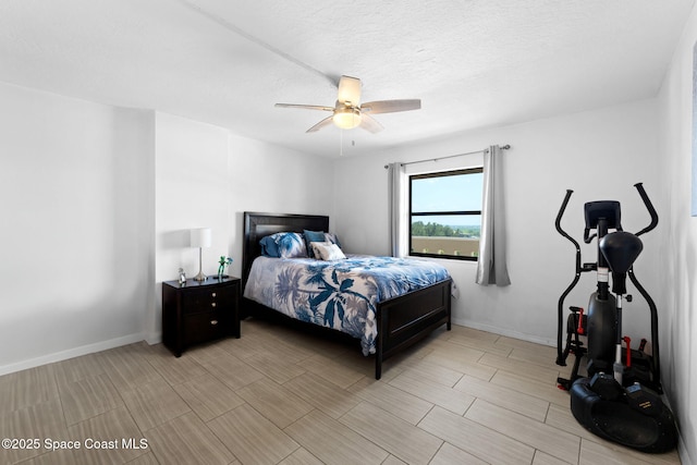 830 N Atlantic Ave Unit 903, Cocoa Beach, FL 32931 - bedroom featuring wood finish floors and a ceiling fan