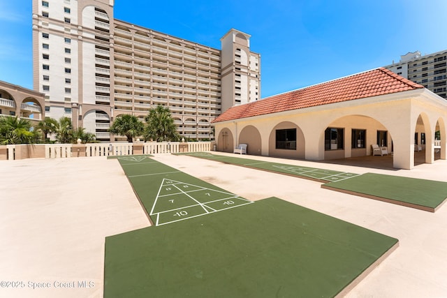 830 N Atlantic Ave Unit 903, Cocoa Beach, FL 32931 - view of community featuring shuffleboard