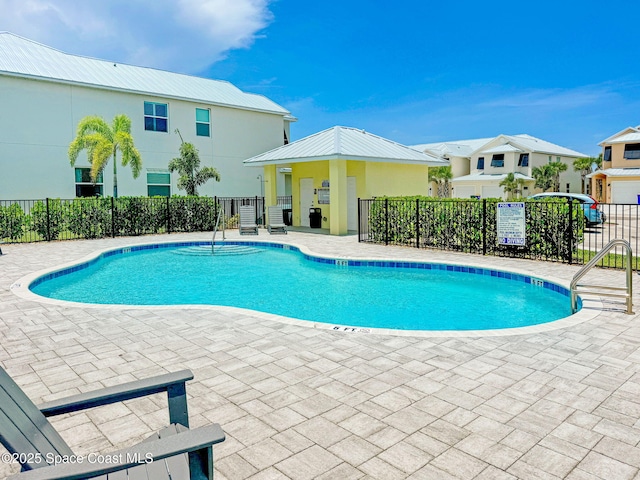 3930 Playa Del Sol Dr Unit 106, Rockledge, FL 32955 - community pool featuring a patio area