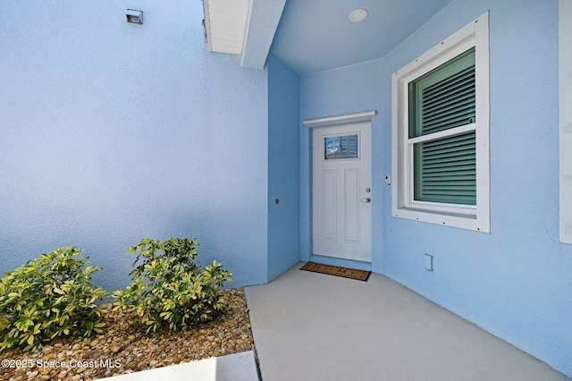 3930 Playa Del Sol Dr Unit 106, Rockledge, FL 32955 - property entrance featuring stucco siding