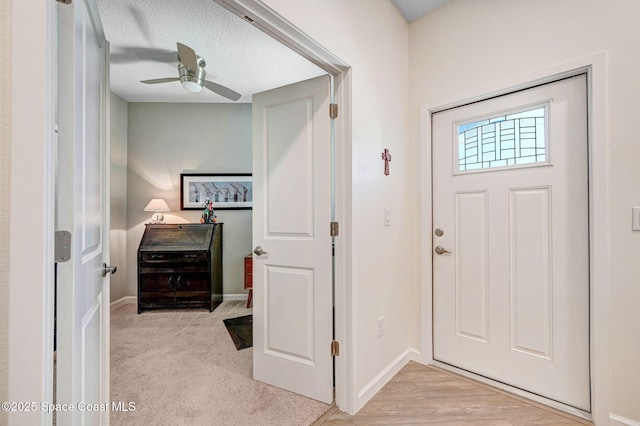 3930 Playa Del Sol Dr Unit 106, Rockledge, FL 32955 - entrance foyer with a ceiling fan and baseboards