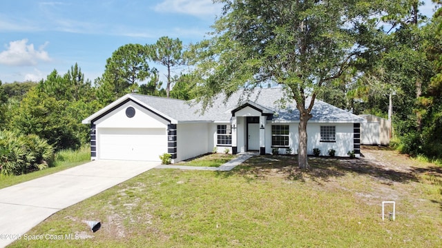 3162 San Salvador Ave, Palm Bay, FL 32909 - ranch-style home with concrete driveway, an attached garage, a front yard, and stucco siding