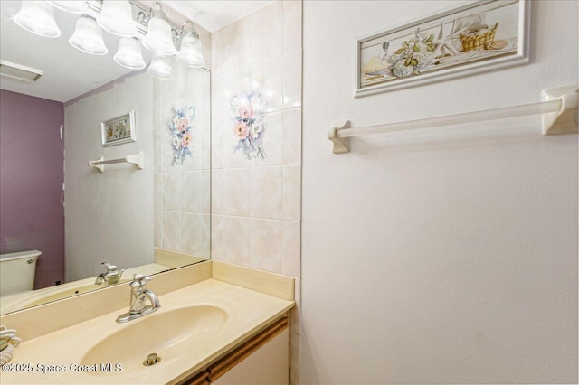 101 La Costa St Unit 2B, Melbourne Beach, FL 32951 - bathroom with vanity and toilet