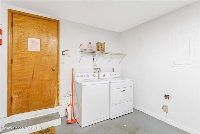 101 La Costa St Unit 2B, Melbourne Beach, FL 32951 - laundry room featuring separate washer and dryer and electric panel