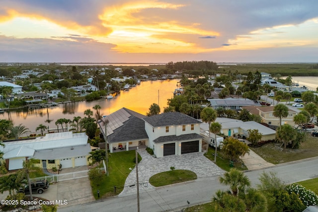 29 Azalea Dr, Cocoa Beach, FL 32931 - aerial view at dusk of a water view and a residential view