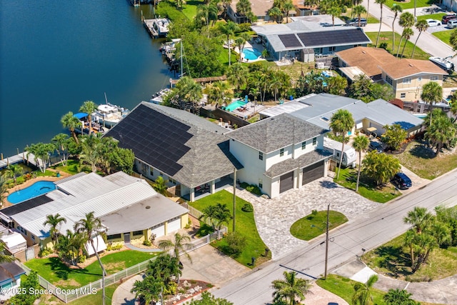 29 Azalea Dr, Cocoa Beach, FL 32931 - aerial view of residential area featuring a pool area and a large body of water