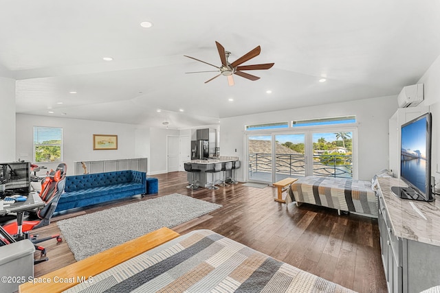 29 Azalea Dr, Cocoa Beach, FL 32931 - living area featuring a wall mounted AC, ceiling fan, dark wood-type flooring, vaulted ceiling, and recessed lighting