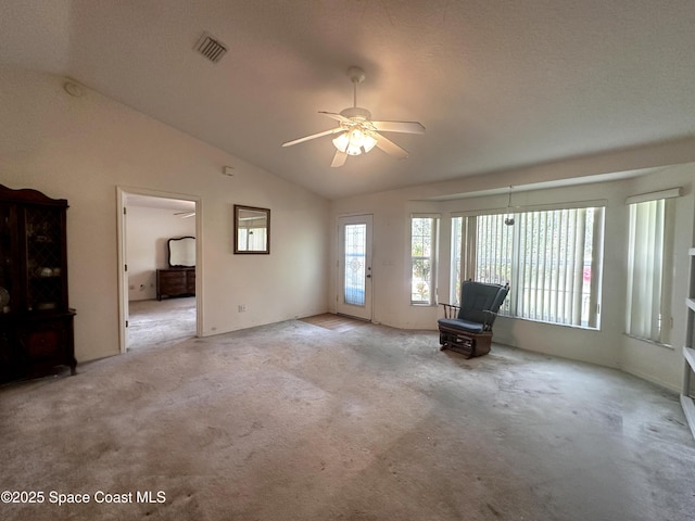 1765 Tatum Blvd, New Smyrna Beach, FL 32168 - unfurnished room with lofted ceiling, light colored carpet, and a ceiling fan