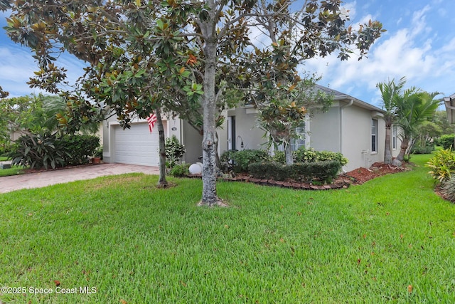 740 Indian Oaks Dr, Melbourne, FL 32901 - view of property hidden behind natural elements with stucco siding, driveway, a front yard, and an attached garage