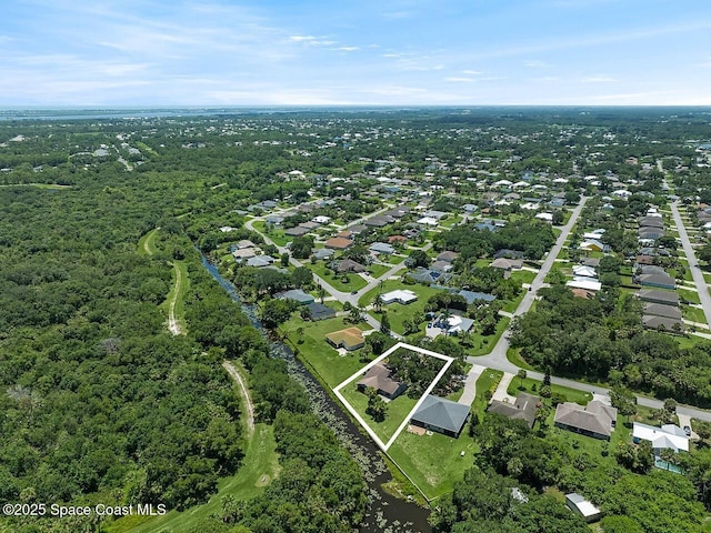 281 Caravan Ter, Sebastian, FL 32958 - aerial view of property and surrounding area with property boundaries highlighted and nearby suburban area