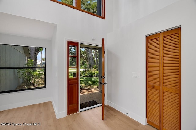 281 Caravan Ter, Sebastian, FL 32958 - foyer entrance featuring wood finished floors and a towering ceiling