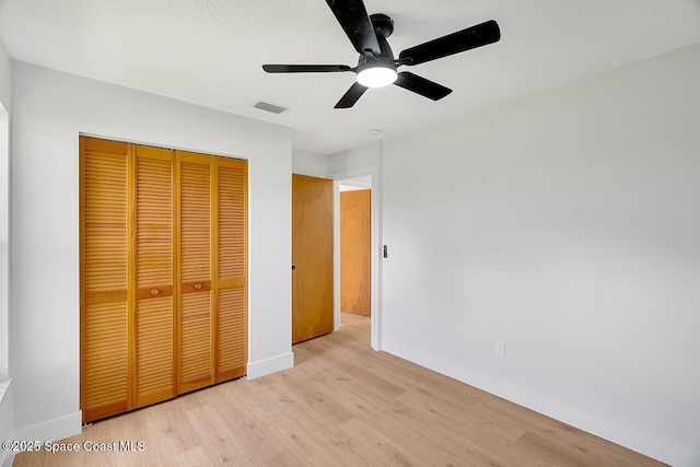 281 Caravan Ter, Sebastian, FL 32958 - unfurnished bedroom with wood finished floors, a closet, and ceiling fan