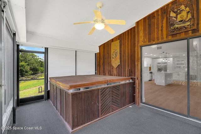 281 Caravan Ter, Sebastian, FL 32958 - unfurnished sunroom with a hot tub
