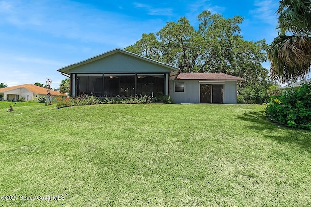 281 Caravan Ter, Sebastian, FL 32958 - back of property featuring a yard and a sunroom