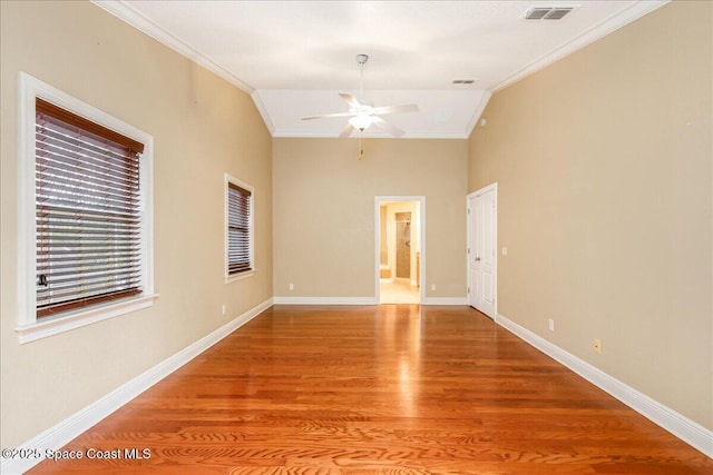 1390 Isabella Dr Unit 106, Melbourne, FL 32935 - spare room featuring ornamental molding, ceiling fan, light wood-style floors, and lofted ceiling