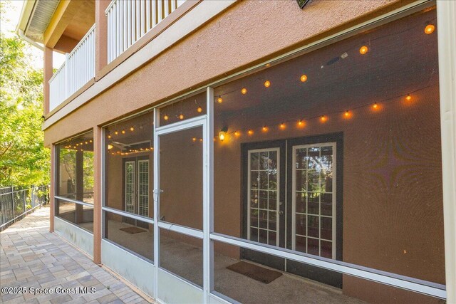 1390 Isabella Dr Unit 106, Melbourne, FL 32935 - view of patio with a sunroom